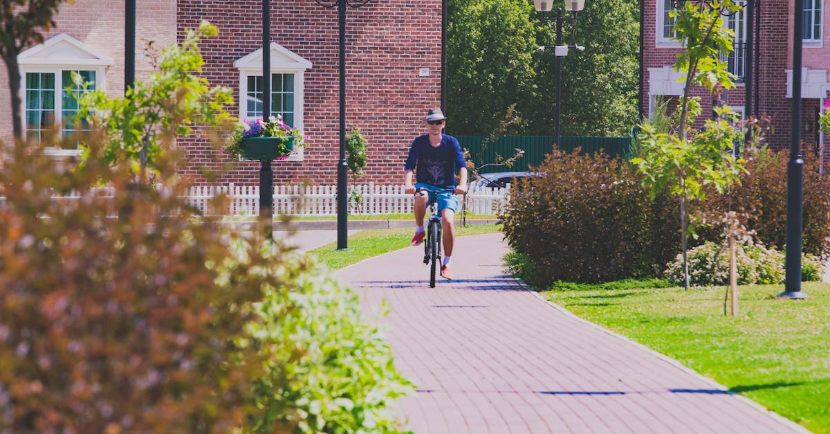 How can I make a Giant with full diamond armor (Protection IV) riding a bat with spawner - Man Riding a Bicycle on a Concrete Road