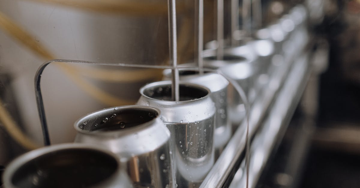 How can I make an automatic cobblestone breaker? - Silver and Black Coffee Cups