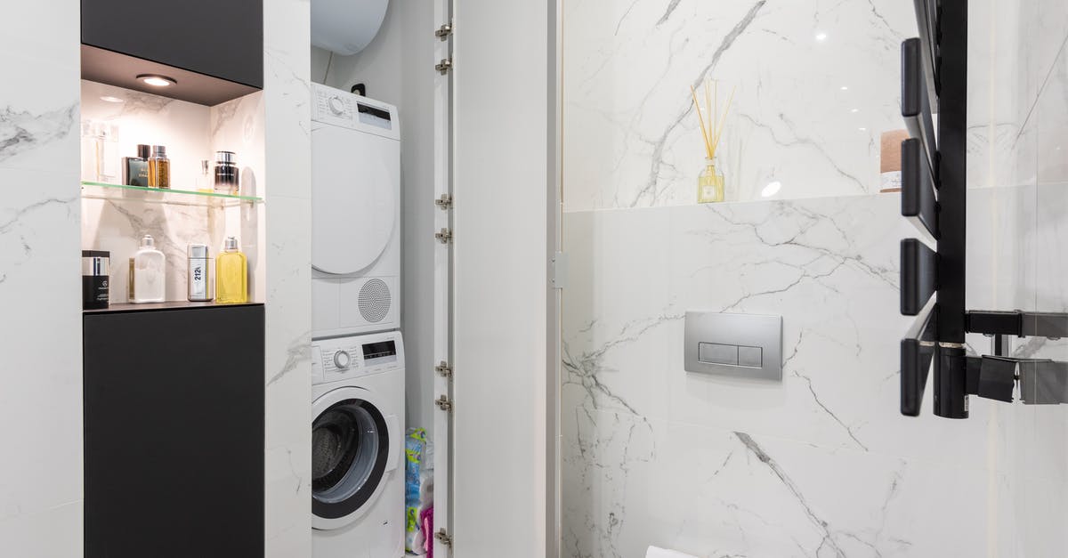 How can I make an automatic door that opens for me only? - Bathroom interior with washing machine against toilet bowl