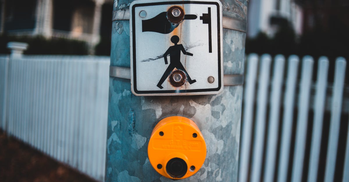 How can I make the crosshair attack indicator have a solid color? - Metal signboard with pedestrian and button on metal pole placed on pavement of crosswalk