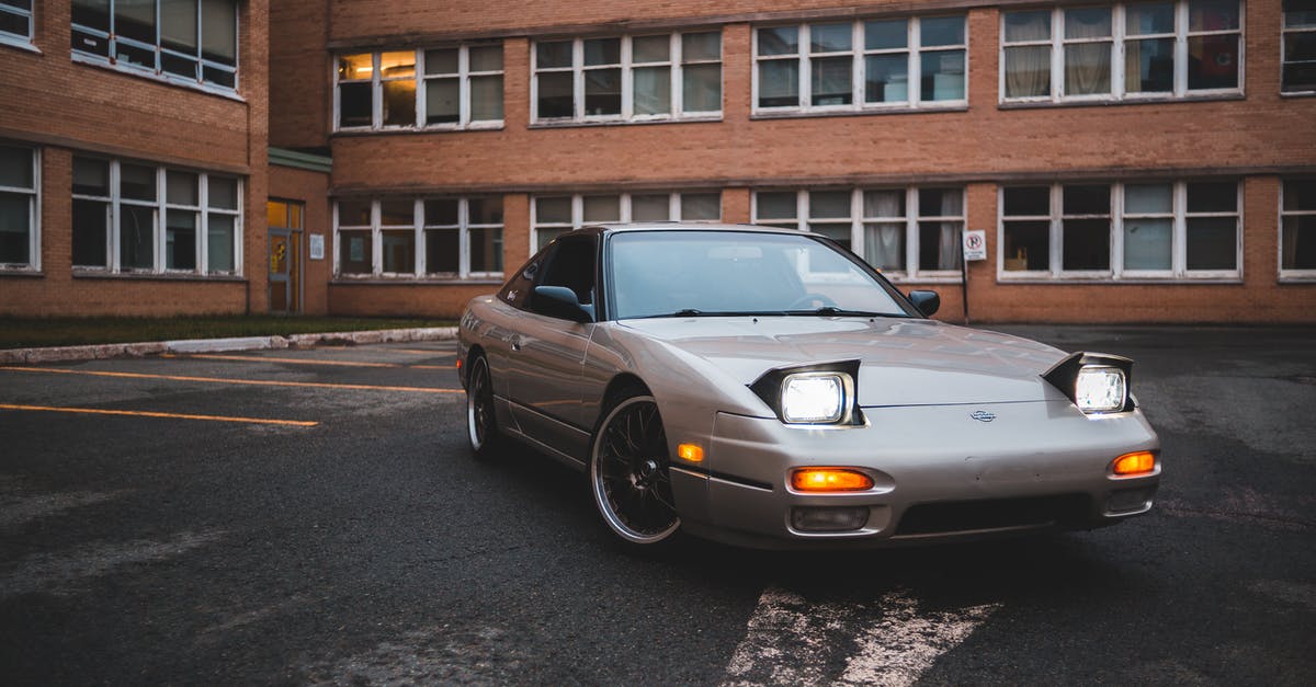 How can I make the crosshair attack indicator have a solid color? - Stylish silver automobile with indicators parked on concrete surface near brick stone building