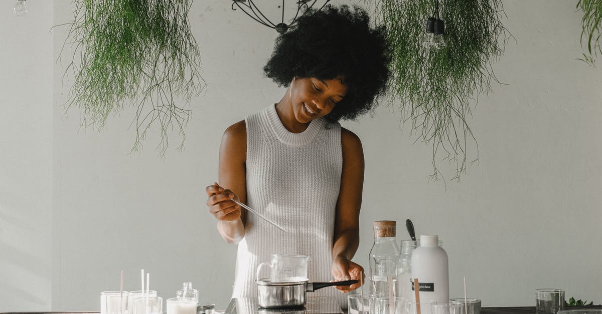 How can I make the /fill command add blocks, but only on top of certain blocks? - Smiling woman making candles in workshop
