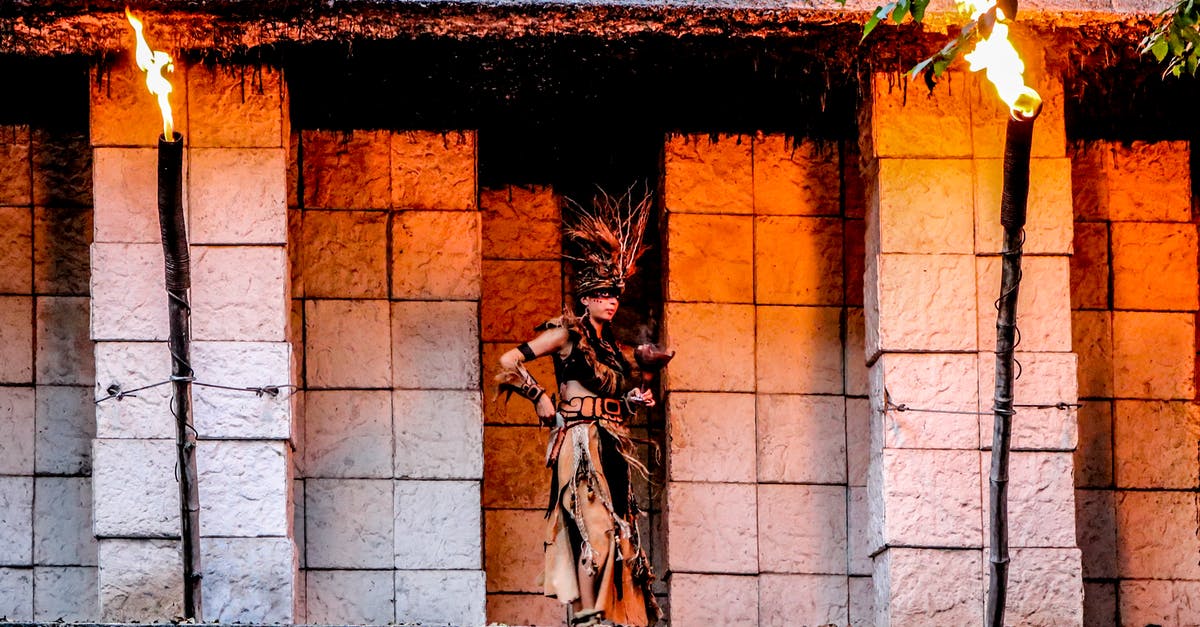 How can I play MineCraft PE with a Fire and IPhone? - Woman Standing in Front of Gray Concrete Structure