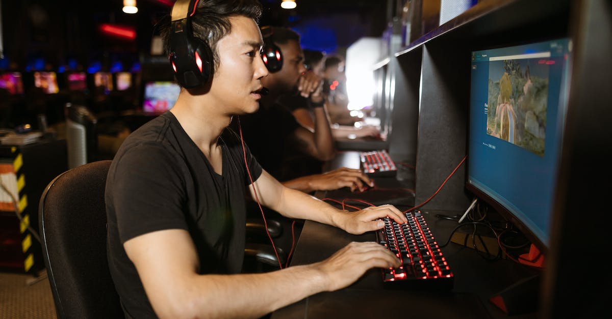 How can I play xbox 360 online games with my friends in Canada and Mexico? - Men Playing Computer Games