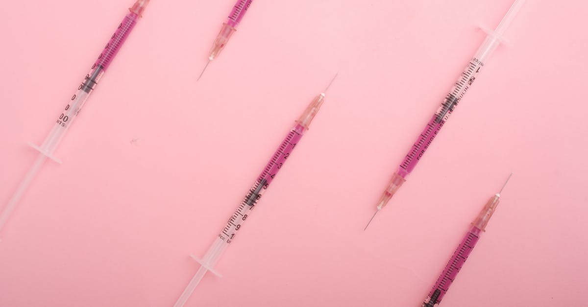How can I prevent fireballs from setting fire? - Top view set of syringes with purple colored liquid medicine arranged on pink background as background How can I prevent fireballs from setting fire? - Top view set of syringes with purple colored liquid medicine arranged on pink background as background