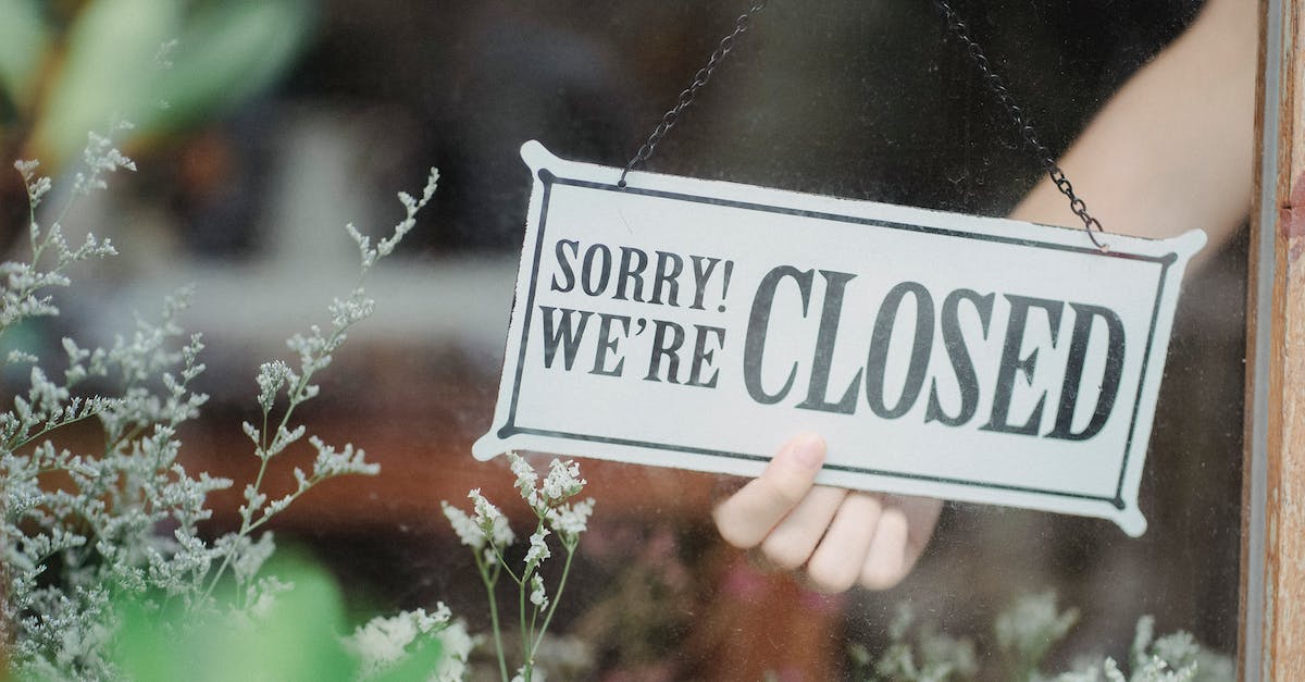 How can I purchase skins for Minecraft through the Xbox/Microsoft Store? - Crop person with signboard in shop