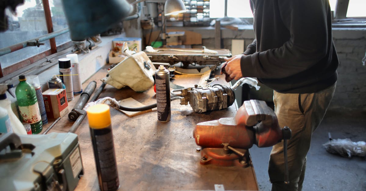 How can I repair anvils? - Photo of Man Wearing Black Jacket While Standing Near Table How can I repair anvils? - Photo of Man Wearing Black Jacket While Standing Near Table