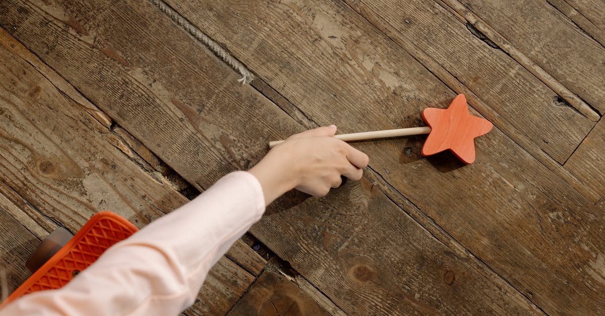 How can I stop myself from picking up certain items for a Pokestop? - A Hand Picking the Wooden Wand on the Floor How can I stop myself from picking up certain items for a Pokestop? - A Hand Picking the Wooden Wand on the Floor