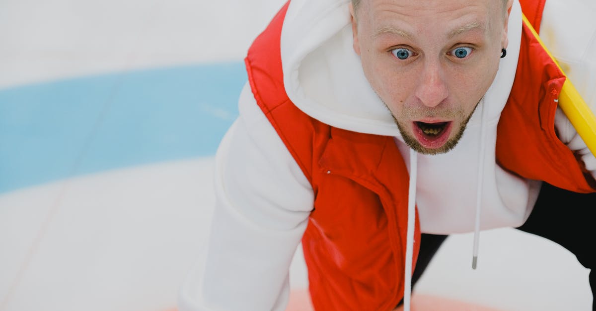 How can I target a player after detecting an item in their inventory - Amazed man in sportswear with opened mouth and broom playing curling on ice sheet with circular target area during game in playing area