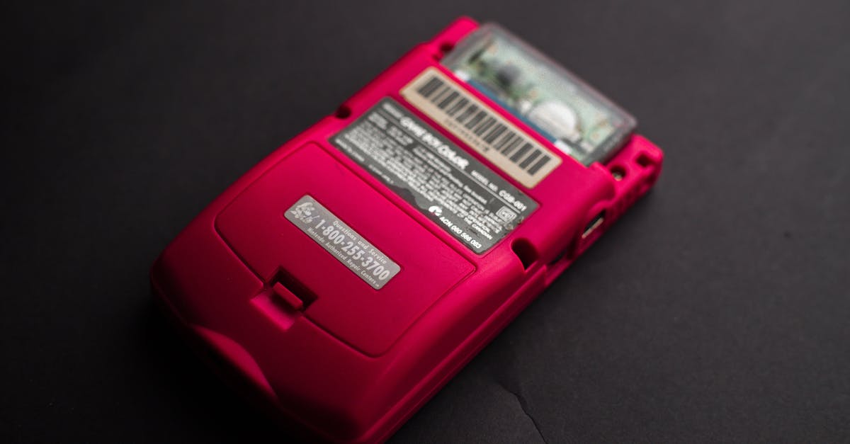 How can I tell if my game saves are backed up? - Back View Close-up Photo of Red Game Boy Console