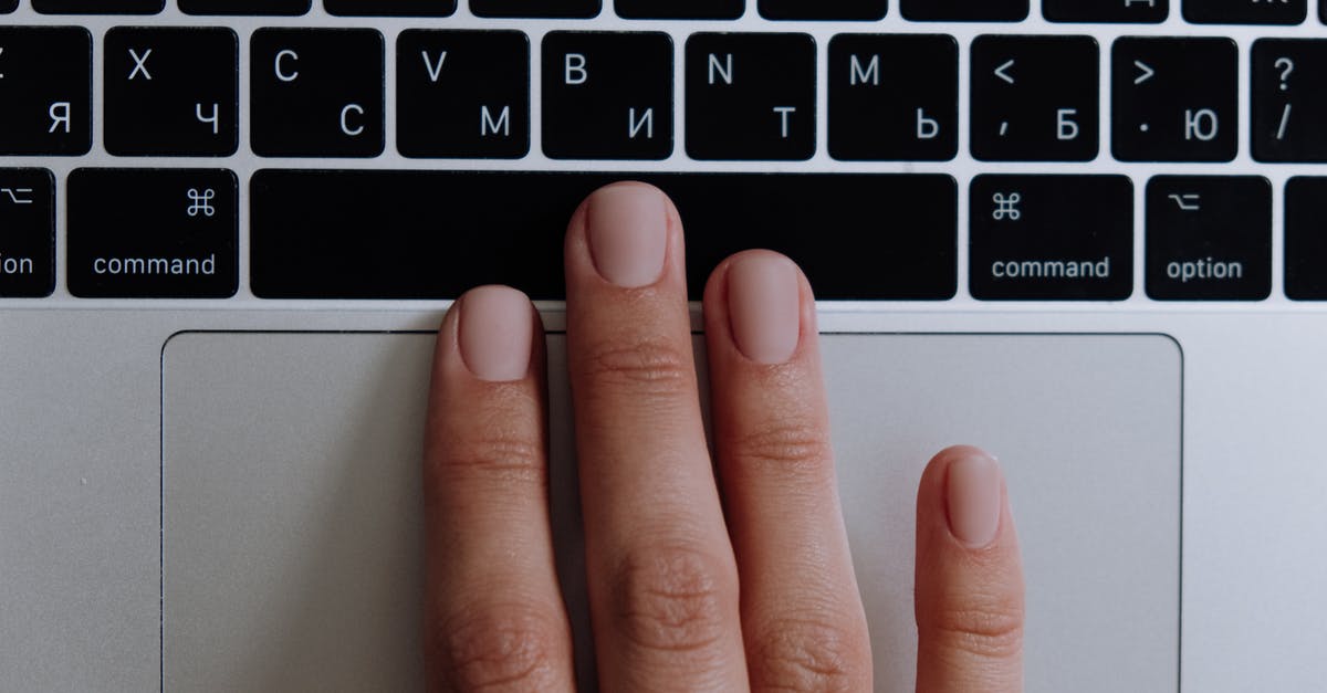 How can I test input lag for my keyboard controller Super Smash Bros Melee dolphin? - Persons Hand on Macbook How can I test input lag for my keyboard controller Super Smash Bros Melee dolphin? - Persons Hand on Macbook