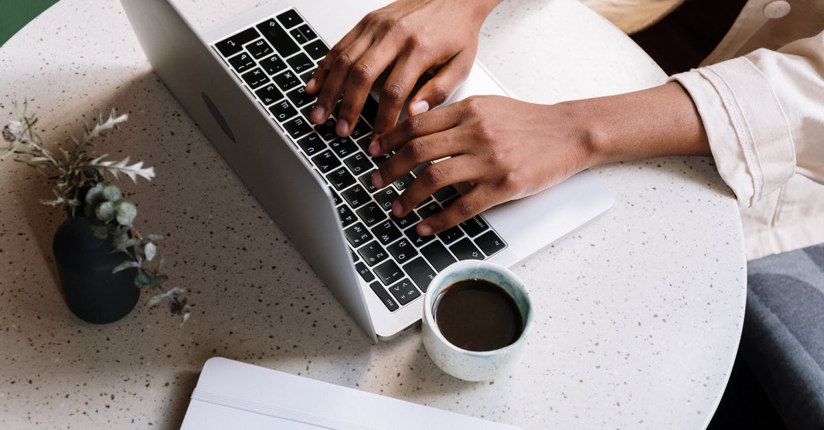 How can I test input lag for my keyboard controller Super Smash Bros Melee dolphin? - Person Using Macbook Pro Beside White Ceramic Mug How can I test input lag for my keyboard controller Super Smash Bros Melee dolphin? - Person Using Macbook Pro Beside White Ceramic Mug