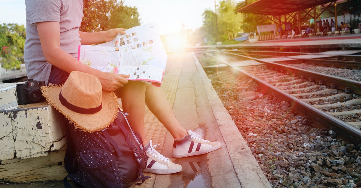 How can I track currently available maps - Man Sitting Beside Black Backpack Near Railway How can I track currently available maps - Man Sitting Beside Black Backpack Near Railway