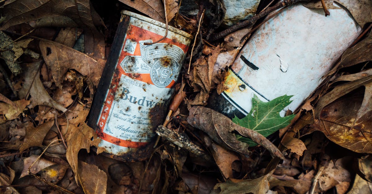 How can I trash unwanted items in Space Engineers? - Close-Up Photo of Rusty Budweiser Can