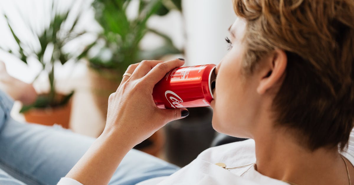 How can I turn my house into a Pokestop? [duplicate] - Crop unrecognizable thoughtful female enjoying coke while resting at home