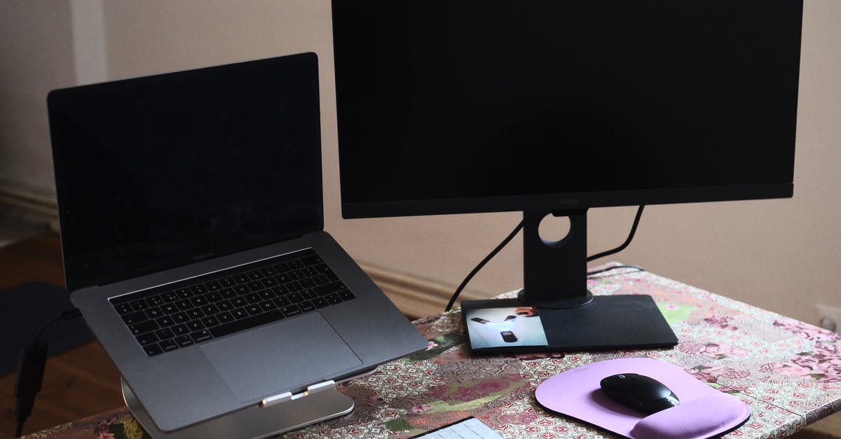 How can I unlock new components? - Laptop and monitor on desk