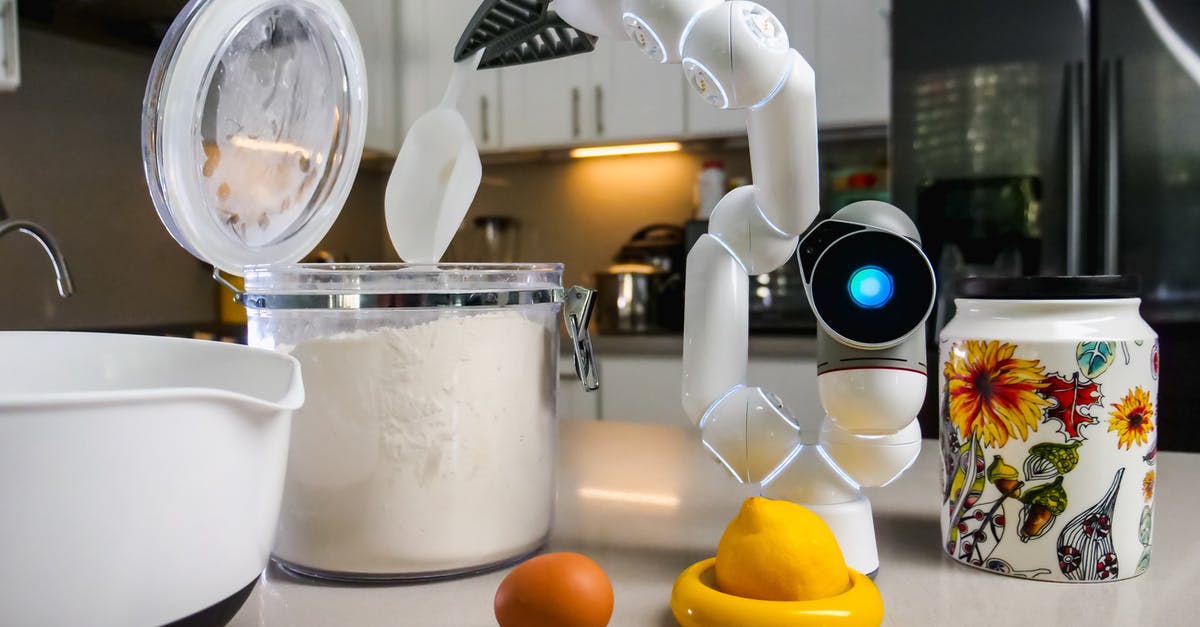 How can I unlock slime science gadgets? - White and Gray Kitchen Appliance Beside White Plastic Container