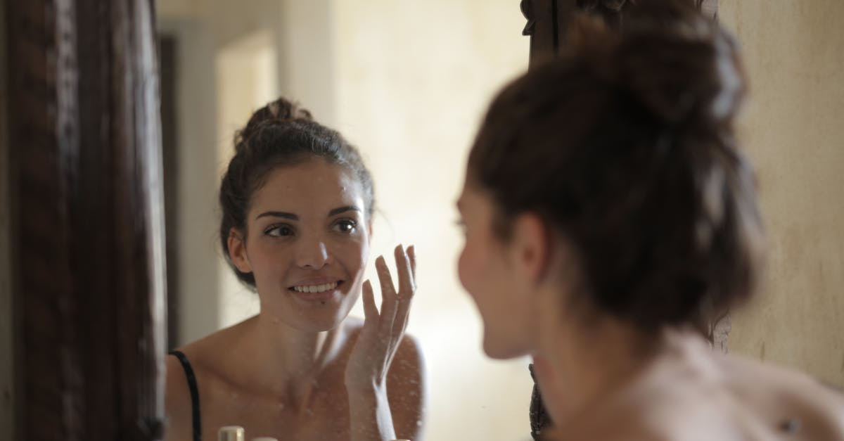 How can I update my skin using the new Minecraft.net? - Reflection Photo of Woman Smiling
