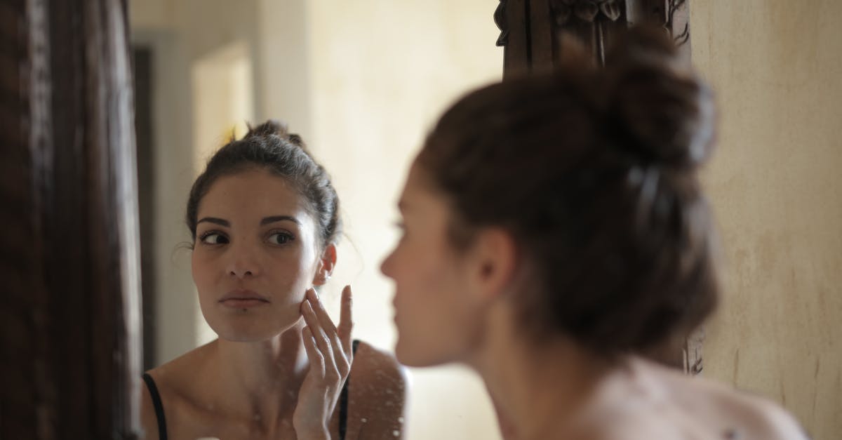 How can I update my skin using the new Minecraft.net? - Reflection Photo of Woman Touching Her Cheek How can I update my skin using the new Minecraft.net? - Reflection Photo of Woman Touching Her Cheek