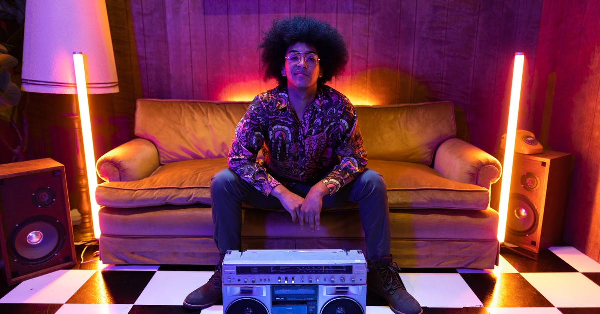 How can one fill an area in checkered pattern? - A Boombox in front of a Man Sitting on the Couch