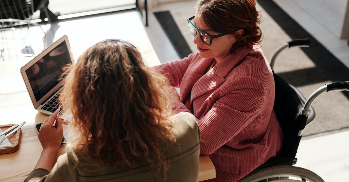 How can someone have two CoC accounts on the same device? - Woman in Red Sweater Wearing Black Framed Eyeglasses Sitting on Wheelchair How can someone have two CoC accounts on the same device? - Woman in Red Sweater Wearing Black Framed Eyeglasses Sitting on Wheelchair