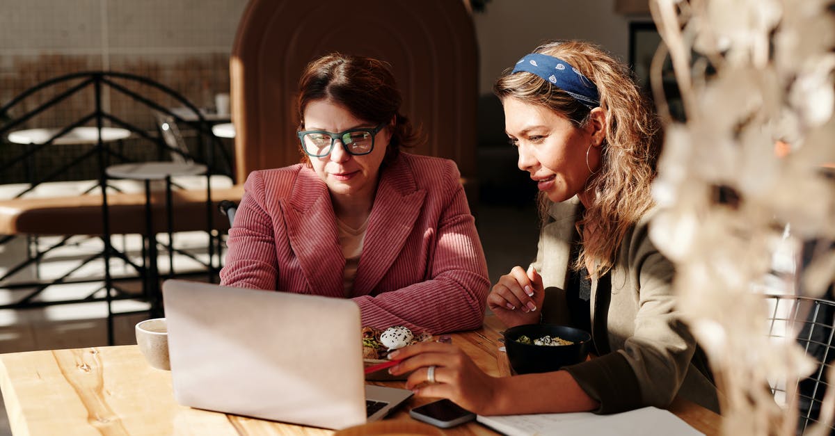 How can someone have two CoC accounts on the same device? - Woman in Red Knit Sweater Sitting by the Table How can someone have two CoC accounts on the same device? - Woman in Red Knit Sweater Sitting by the Table