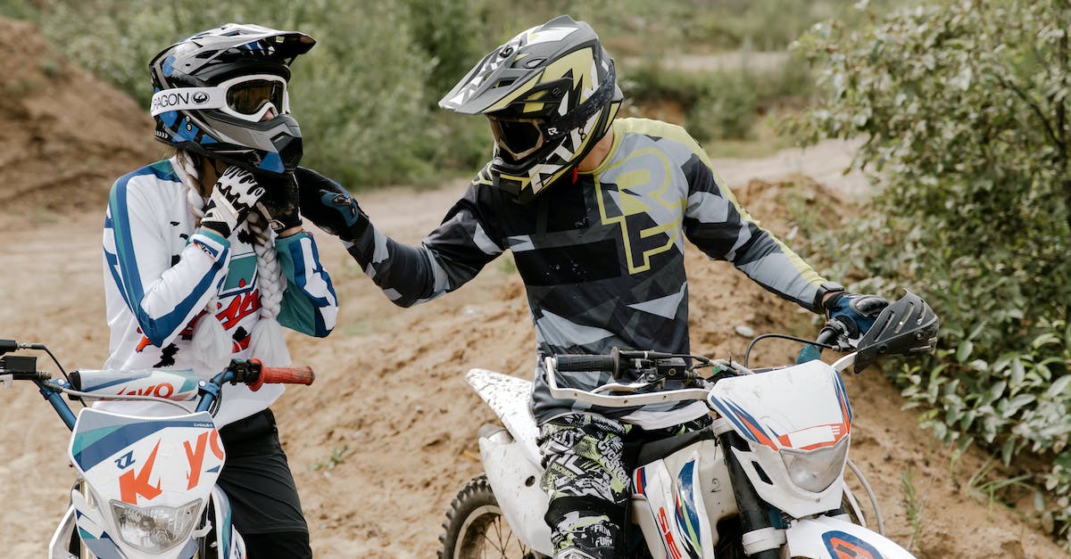 How can the marines take their helmets off on Char? - Two People in Motorcycle Suits Riding on Motocross Dirt Bikes How can the marines take their helmets off on Char? - Two People in Motorcycle Suits Riding on Motocross Dirt Bikes