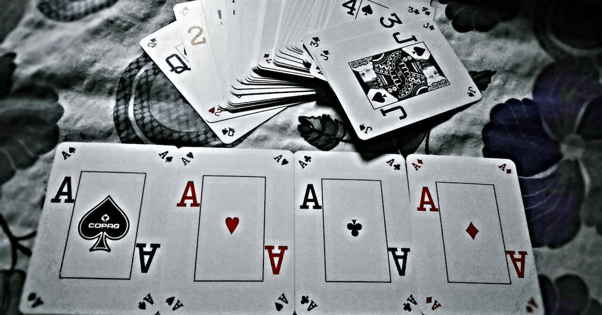 How can you estimate the chances to win a war? - Grayscale Photography of Playing Cards Placed on Cloth