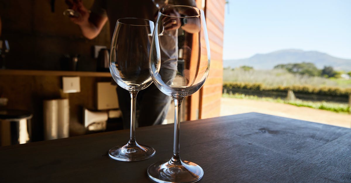 How can you tell if a crate is explosive in the Testing Area? - Clear Wine Glass on Table