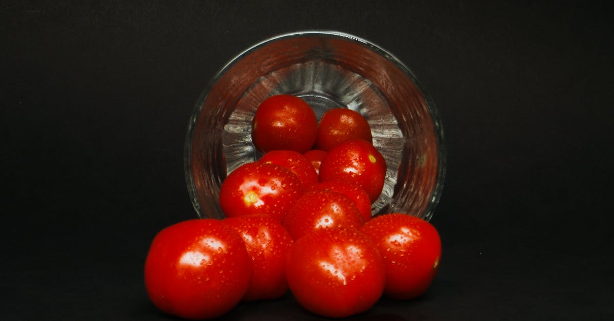How close to water do my tomatoes need to be to considered irrigated? - A Bunch of Wet Red Tomatoes in a Bowl