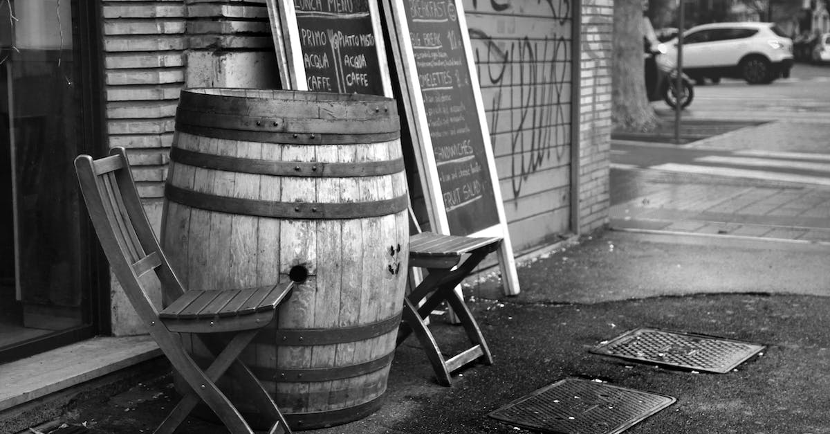 How come some (but not all) of my items that I placed in a barrel gone? - Black and white wooden barrel and chairs placed outside coffee shop near menu chalkboard How come some (but not all) of my items that I placed in a barrel gone? - Black and white wooden barrel and chairs placed outside coffee shop near menu chalkboard
