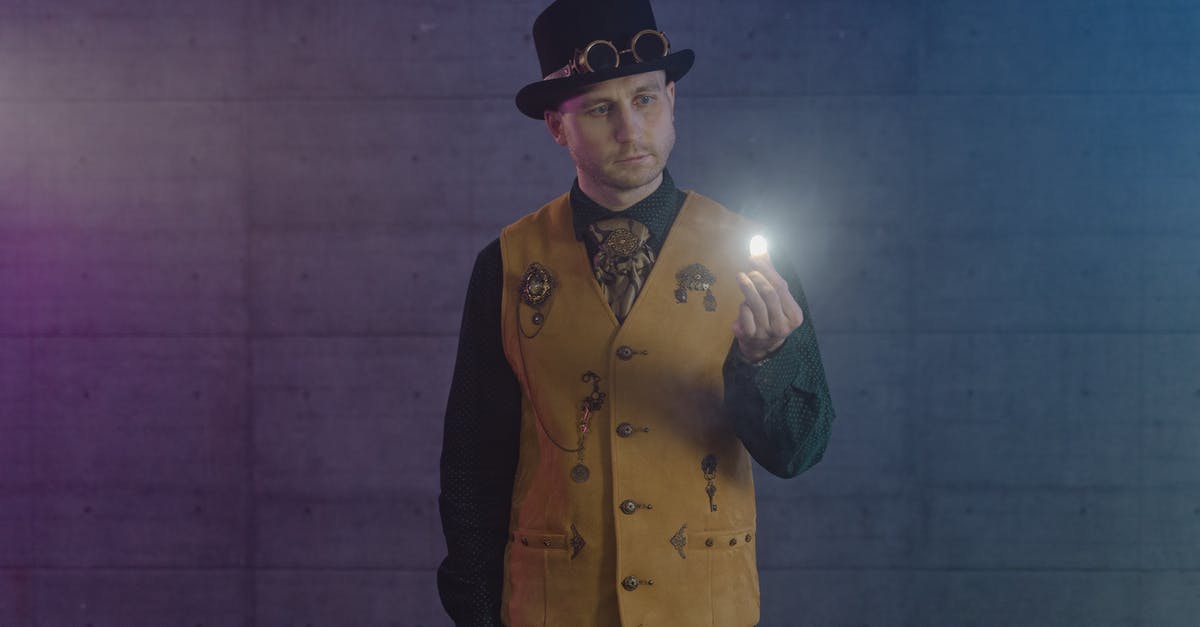 How common are invasions when playing as human? - Man in Yellow Button Up Shirt and Black Hat Standing and Smiling