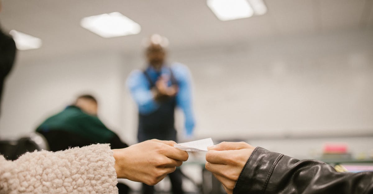 How dependent is Paper Jam on Amiibo? - Shallow Focus Photo of Students Cheating During an Exam
