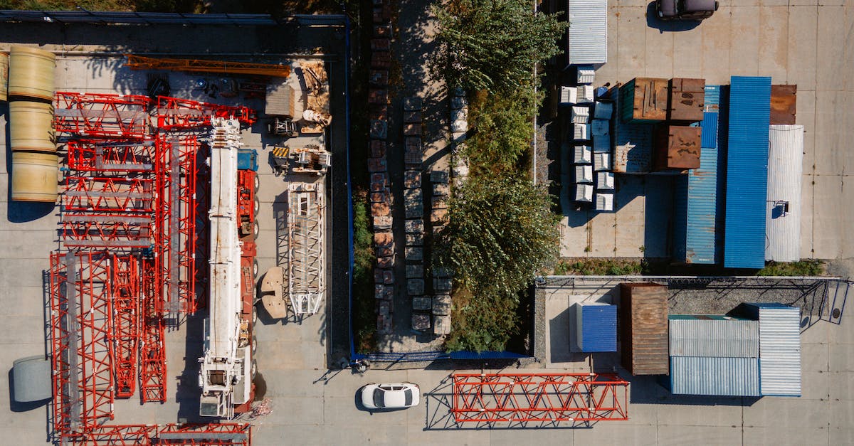 How determininstic is Metal Slug? - Aerial View of Red Steel Frames Near White Car 