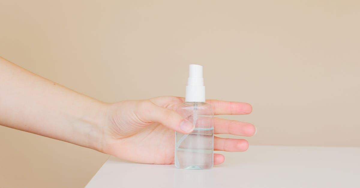 How did Liquid Snake take over the mind of Revolver Ocelot? - Crop woman taking bottle of antiseptic from table How did Liquid Snake take over the mind of Revolver Ocelot? - Crop woman taking bottle of antiseptic from table