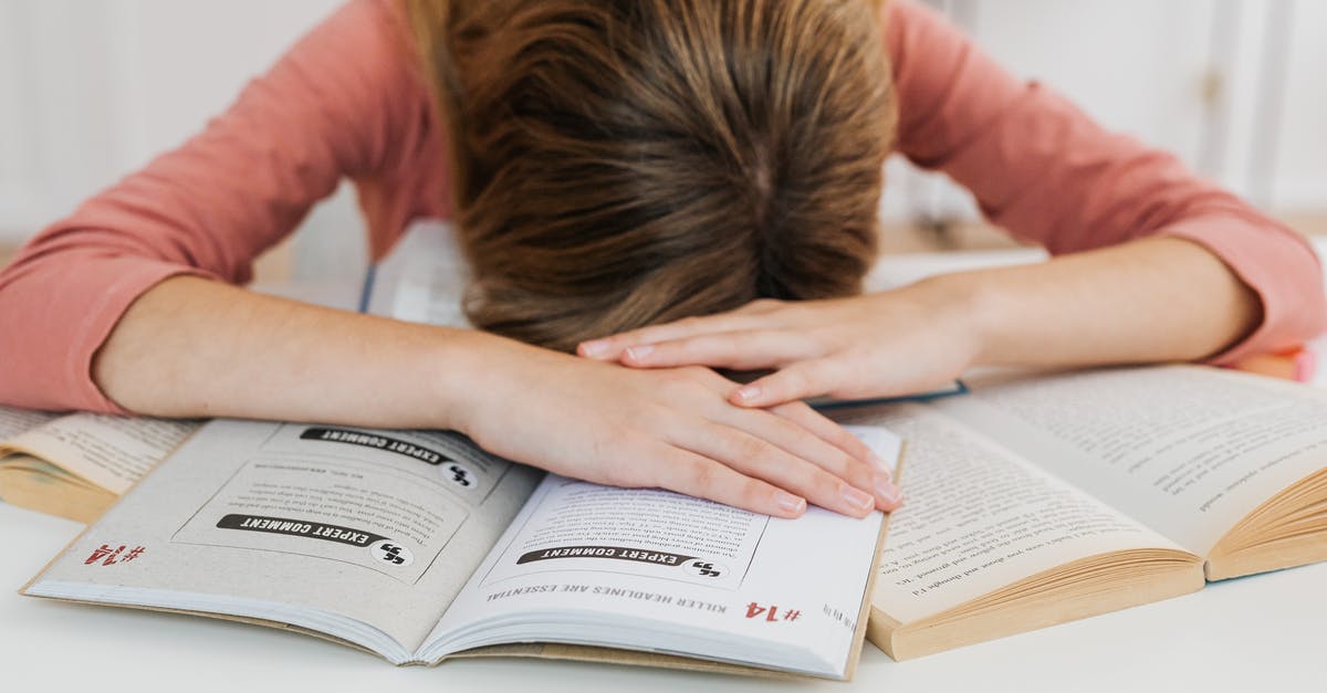 How did the Bloody Girl die? - Person Reading Book on Table