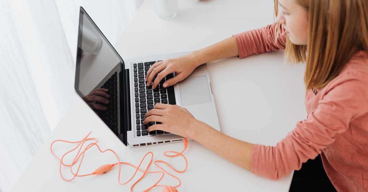 How did the Bloody Girl die? - Girl Using Laptop