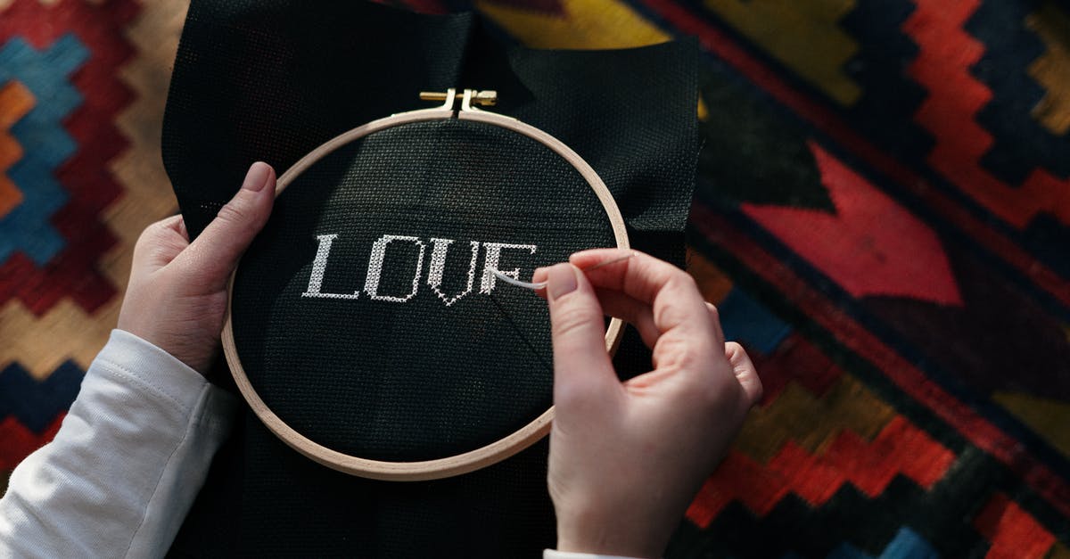 How do Alliance team-ups work? - Close up of a Person Doing Embroidery Work on Black Fabric How do Alliance team-ups work? - Close up of a Person Doing Embroidery Work on Black Fabric