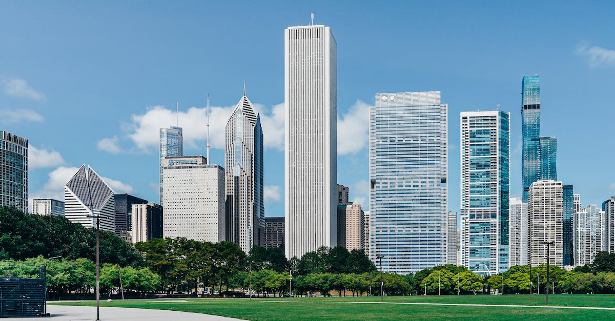 How do city states' gold investment quests work? - Modern city district with skyscrapers near green lawn How do city states' gold investment quests work? - Modern city district with skyscrapers near green lawn