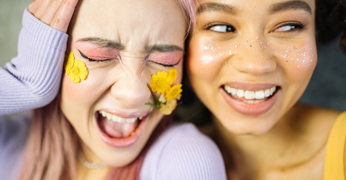 How do hives generate XP? - Woman in White Shirt Smiling Beside Woman in White Shirt