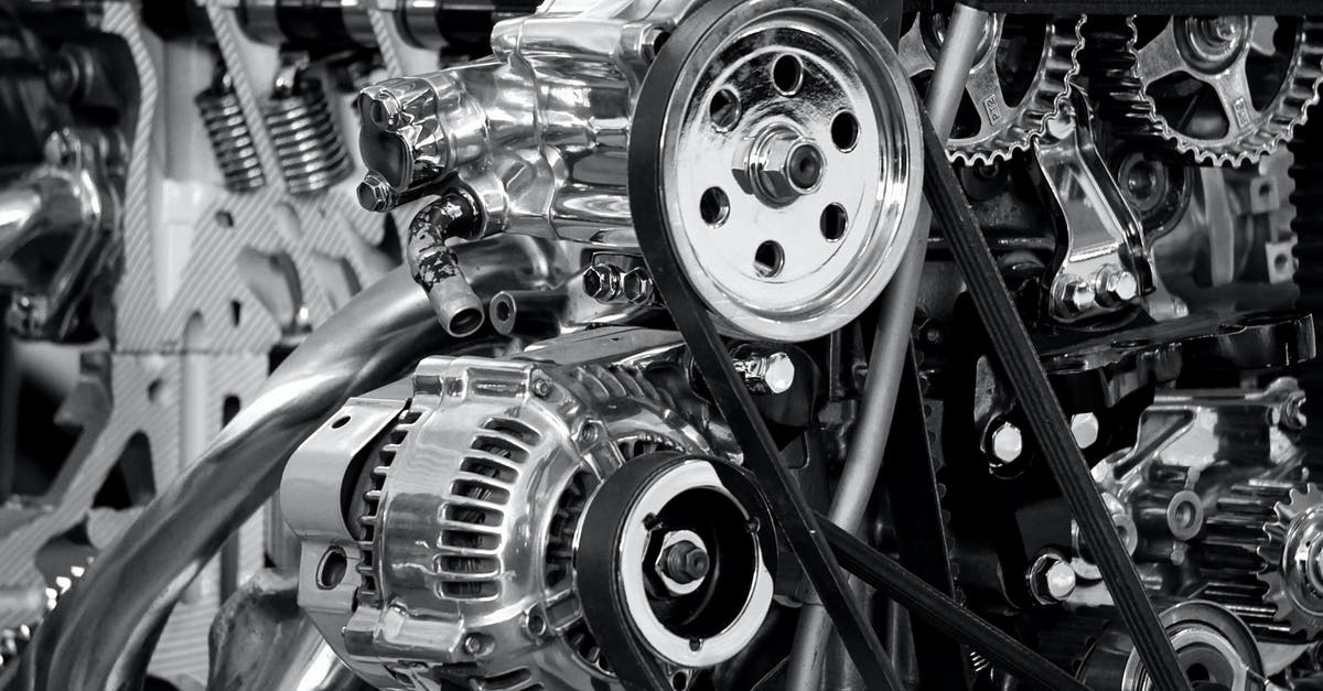 How do I access Metal Gear V Multiplayer? - Greyscale Photography of Car Engine