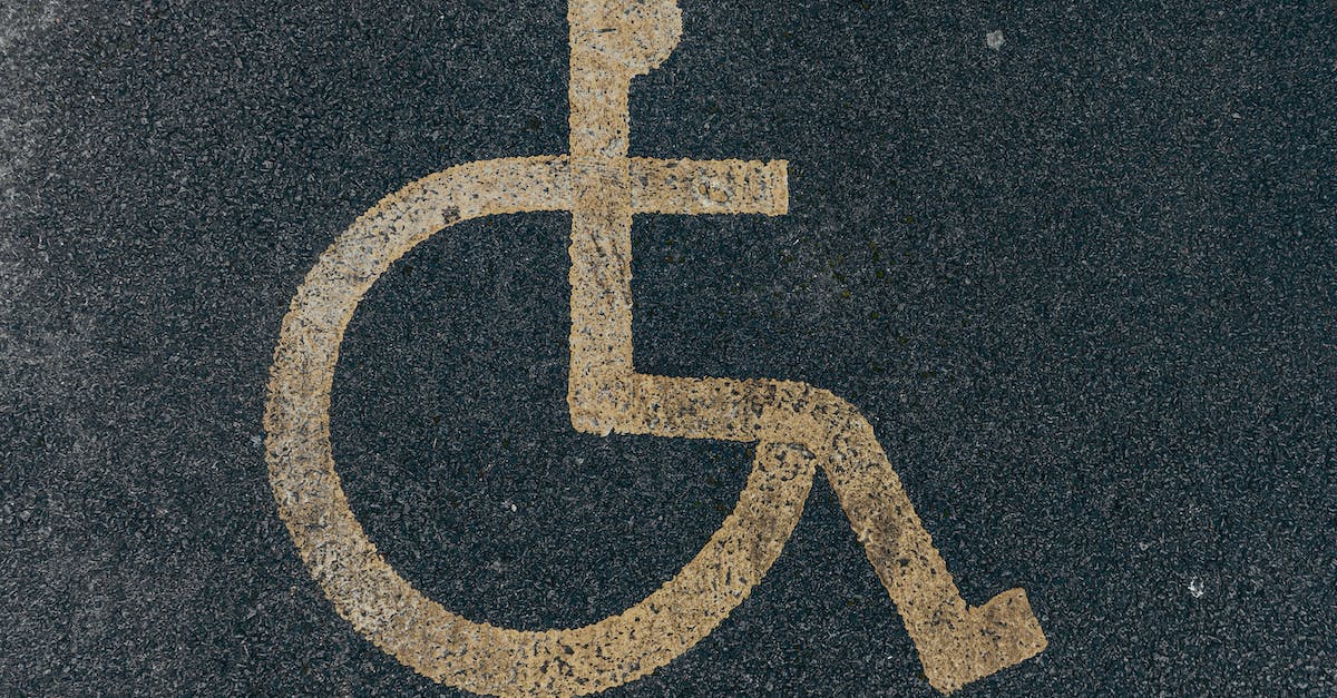 How do I access the 360 guide while on XB1? - Painted Disability Icon on Asphalt Pavement