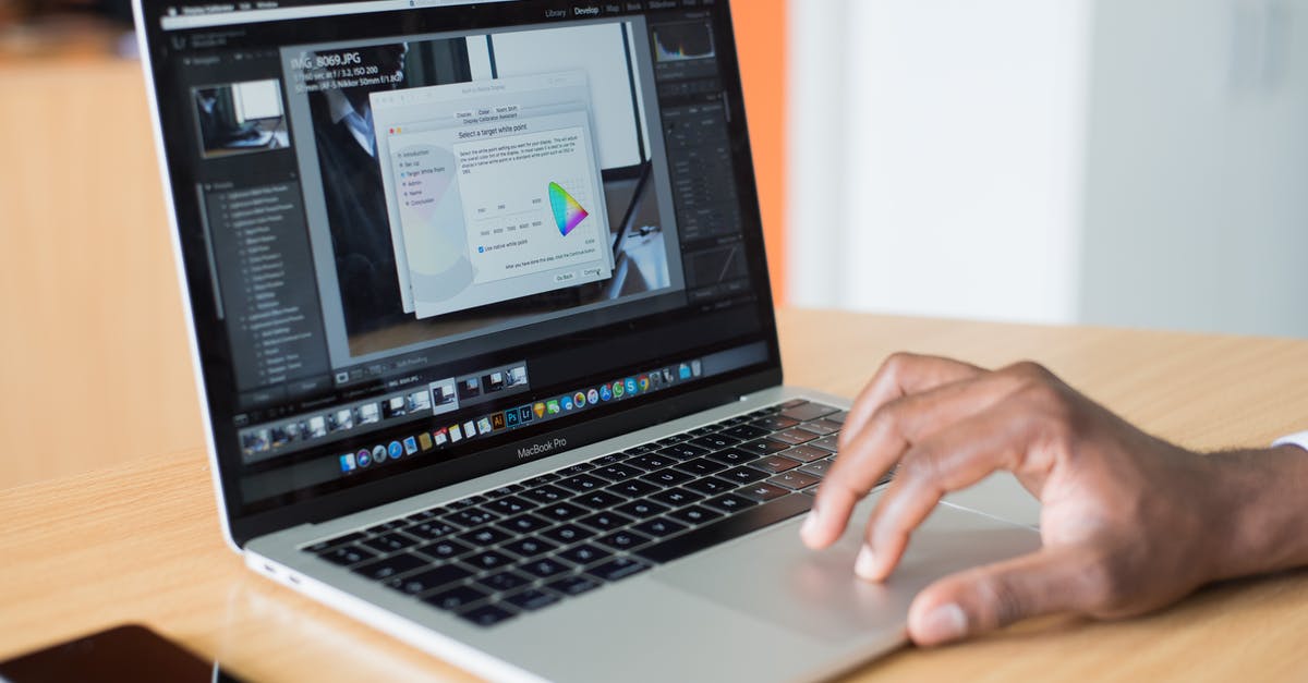 How do I access unlocked weapons in Dead Cells? - Person Operating Macbook Pro