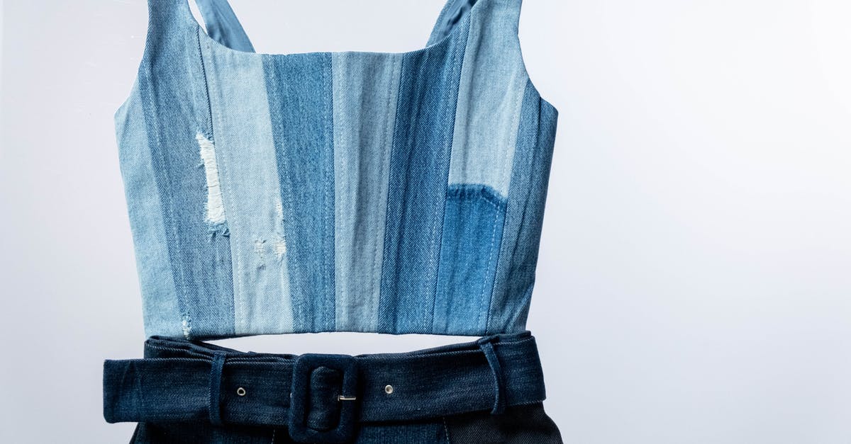 How do I acquire Outfit Vouchers? - Blue and Black Leather Bag