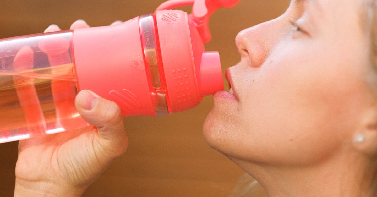 How Do I Activate the Cottage Blueprint? - Side view crop pretty thirsty female drinking fresh cold water from reusable bottle outside cottage How Do I Activate the Cottage Blueprint? - Side view crop pretty thirsty female drinking fresh cold water from reusable bottle outside cottage
