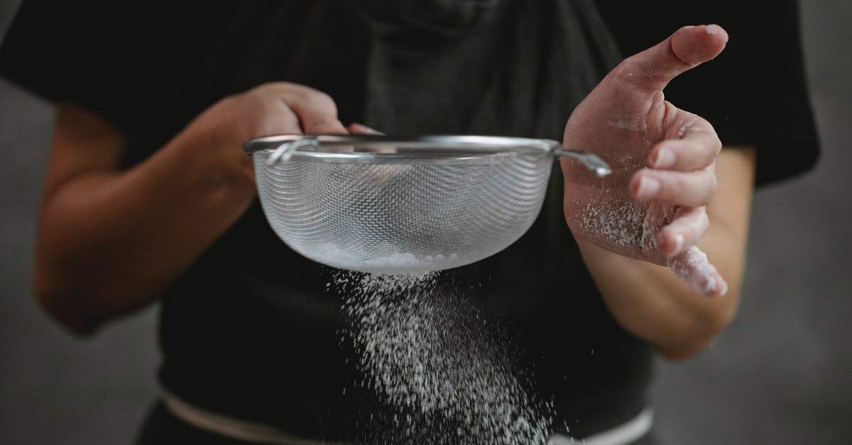 How do I add a Pokestop to my area? - Crop anonymous cook in apron sifting flour while preparing baking dish against gray background How do I add a Pokestop to my area? - Crop anonymous cook in apron sifting flour while preparing baking dish against gray background