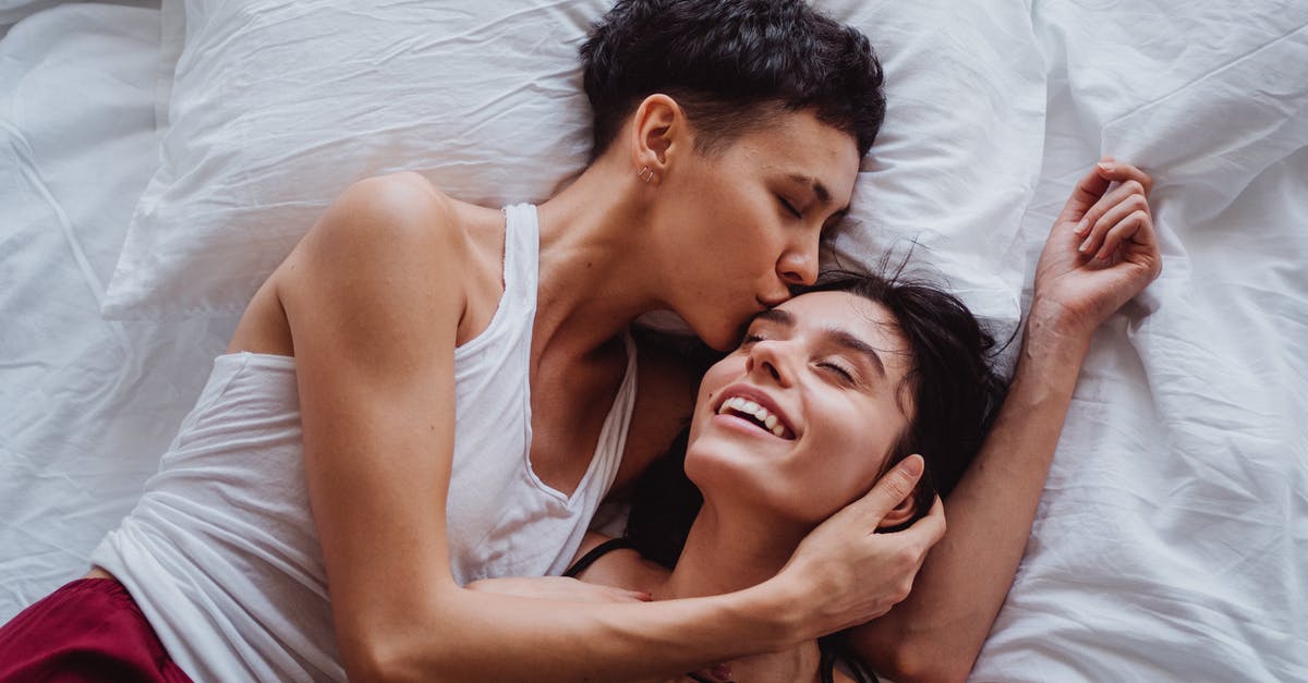 How do I advance time? - Woman Kissing Another Woman on the Forehead