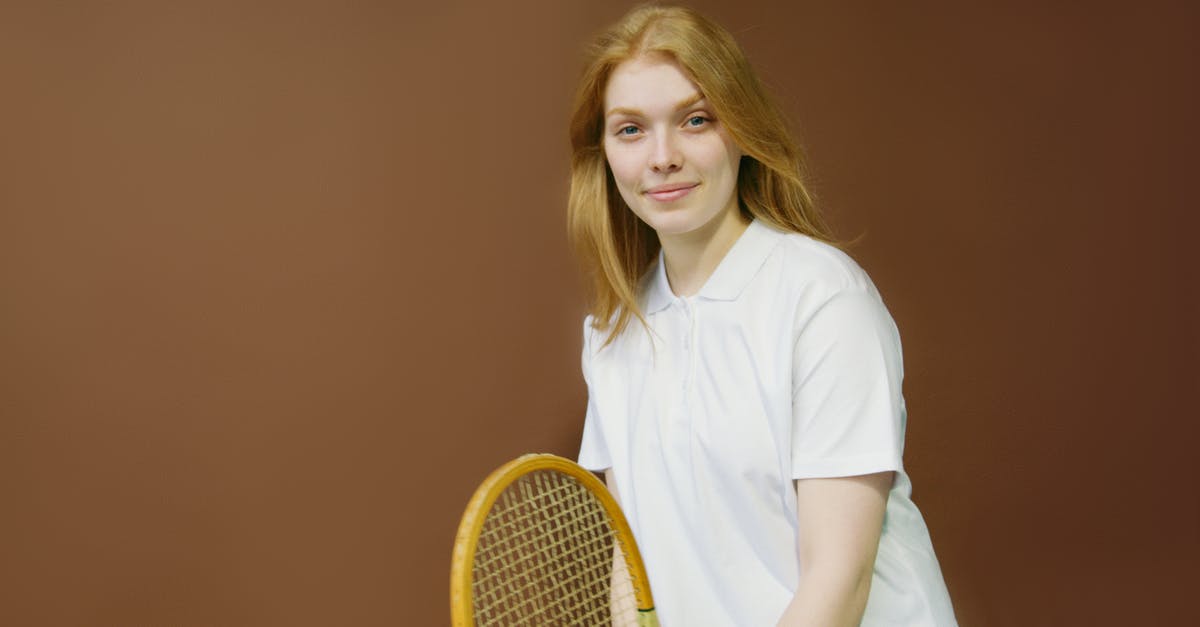 How do I apply a specific command to a player wearing certain gear? [duplicate] - A Woman Smiling and Holding Tennis Racket 