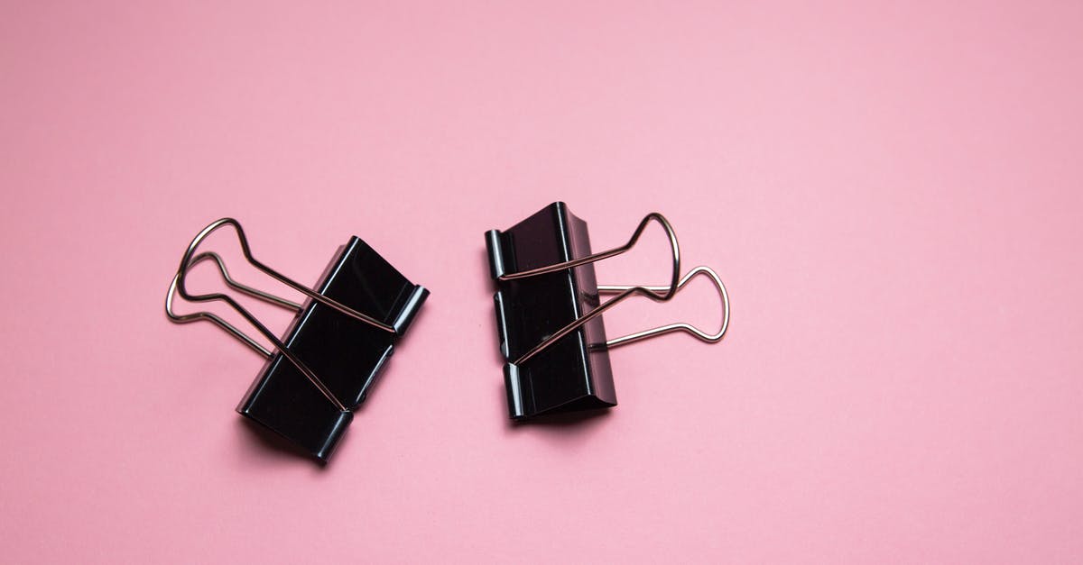 How do I attach ragdolls to other objects? - Black paper clamps scattered on pink surface How do I attach ragdolls to other objects? - Black paper clamps scattered on pink surface