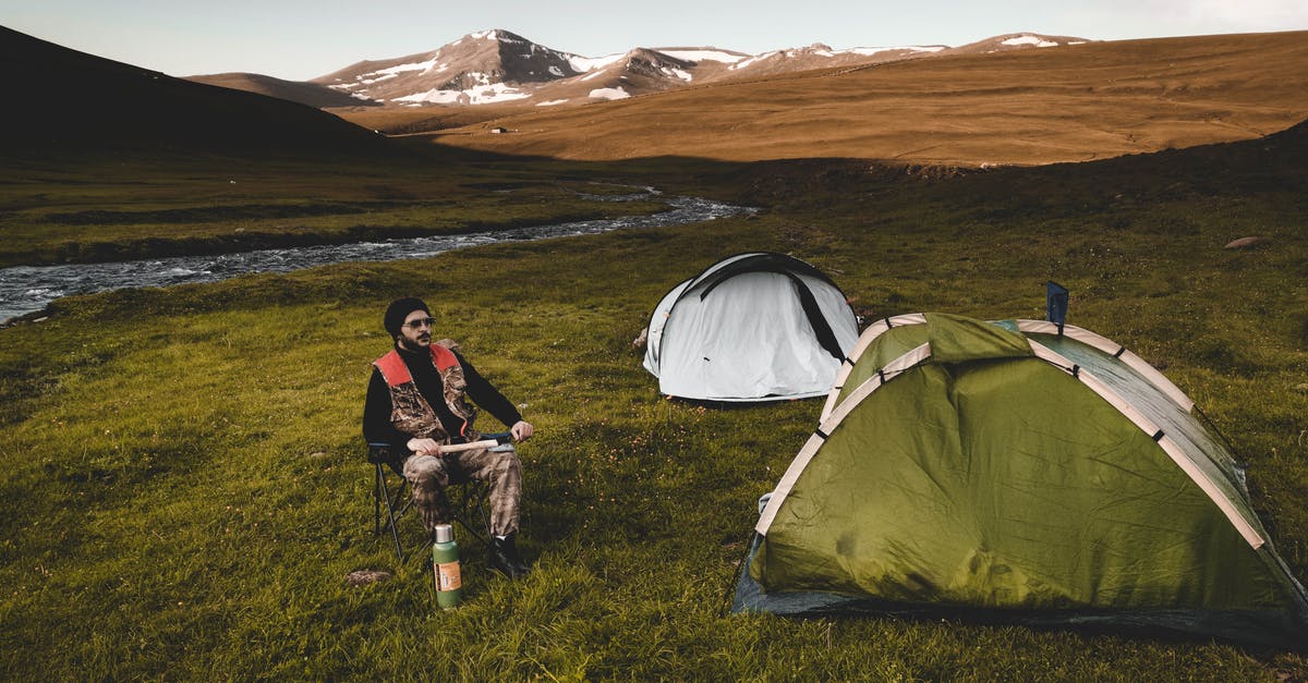 How do I break sturdy-looking rocks? - Man resting on chair in campground